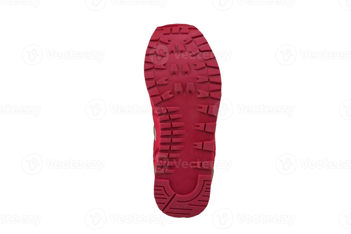 Red rubber sole with sneakers on a white background. photo