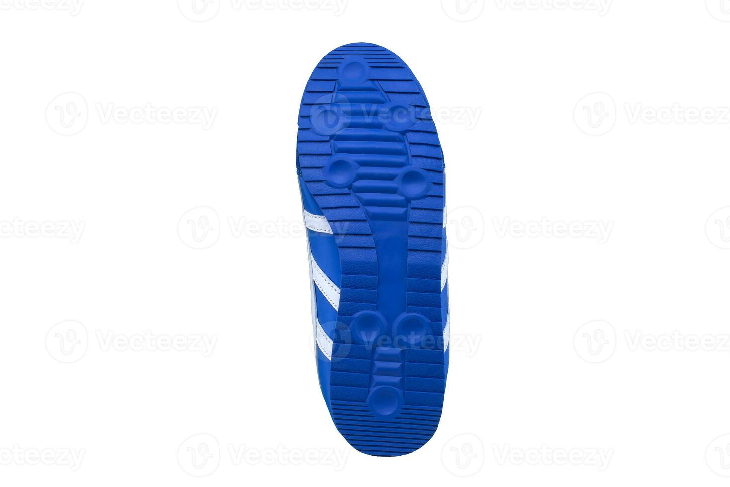 Blue rubber sole with sneakers on a white background. photo