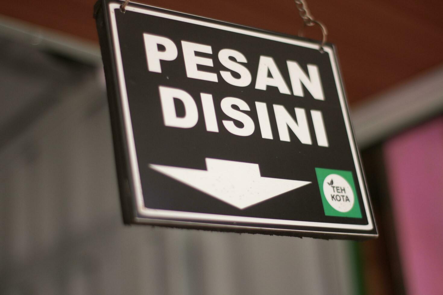 Magelang, Indonesia - 15 October 2023 .The message here is written in black to show that those of us who want to order ice must come this way. photo