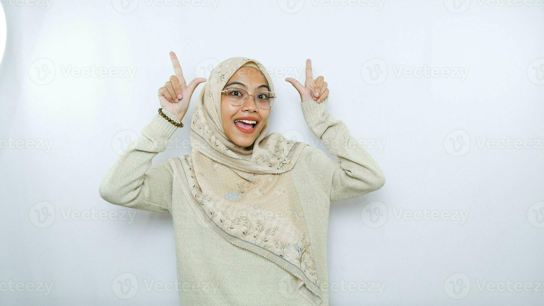 happy young asian woman in casual shirt. Charming female lady open hands palm up holding something on isolated White background. photo