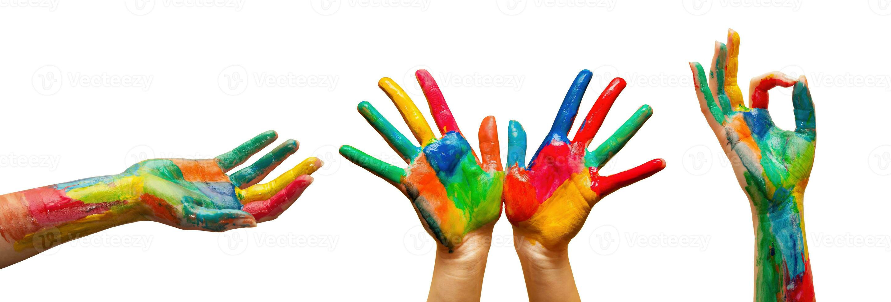 Hands painted in colorful paint in gestures collection, set on white background photo