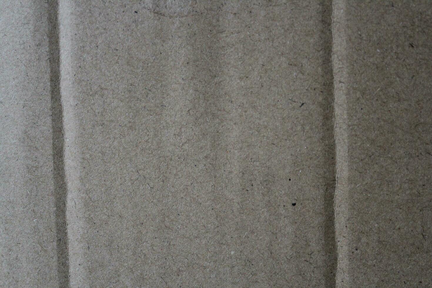 Torn paper background with details, Grungy brown paper surface, rustic paper texture photo