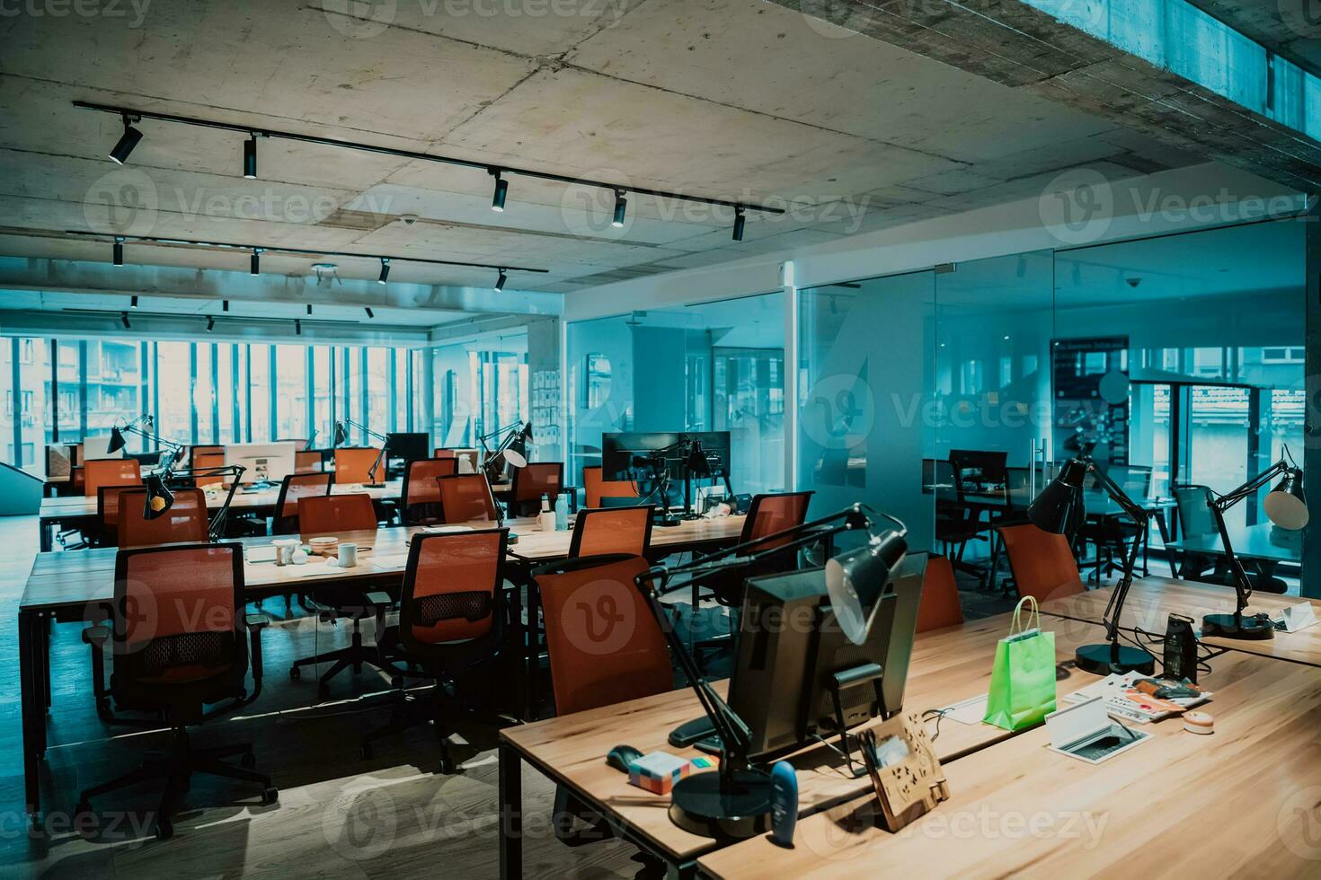 an office with many desks and chairs photo