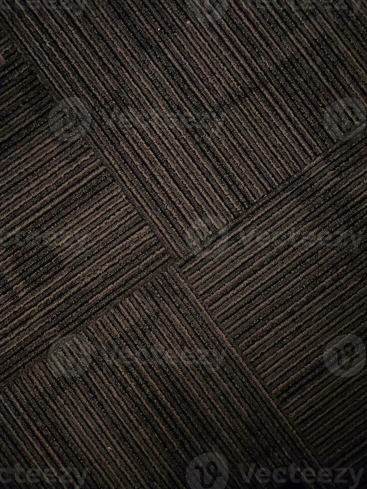 Black striped carpet texture background photo