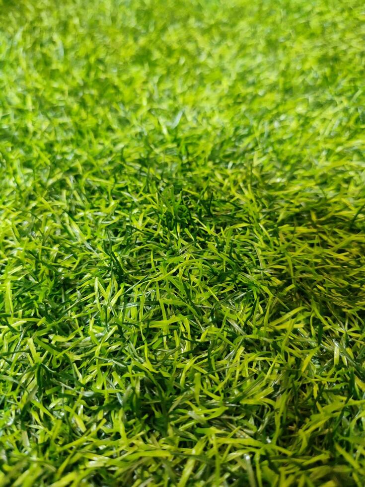 Artificial Grass synthetic grass texture pattern background photo