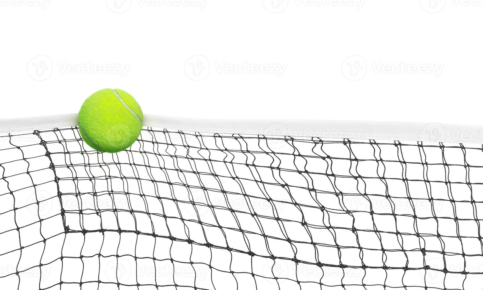 tennis ball into the net Isolated on white background. photo
