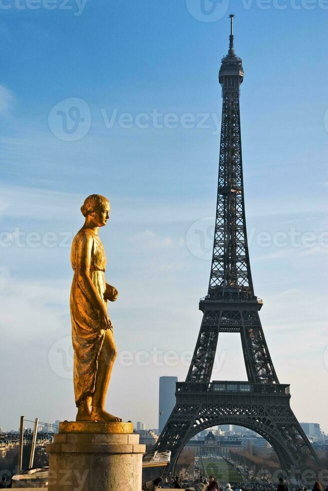 Eiffel Tower and Statue Parisian Majesty photo