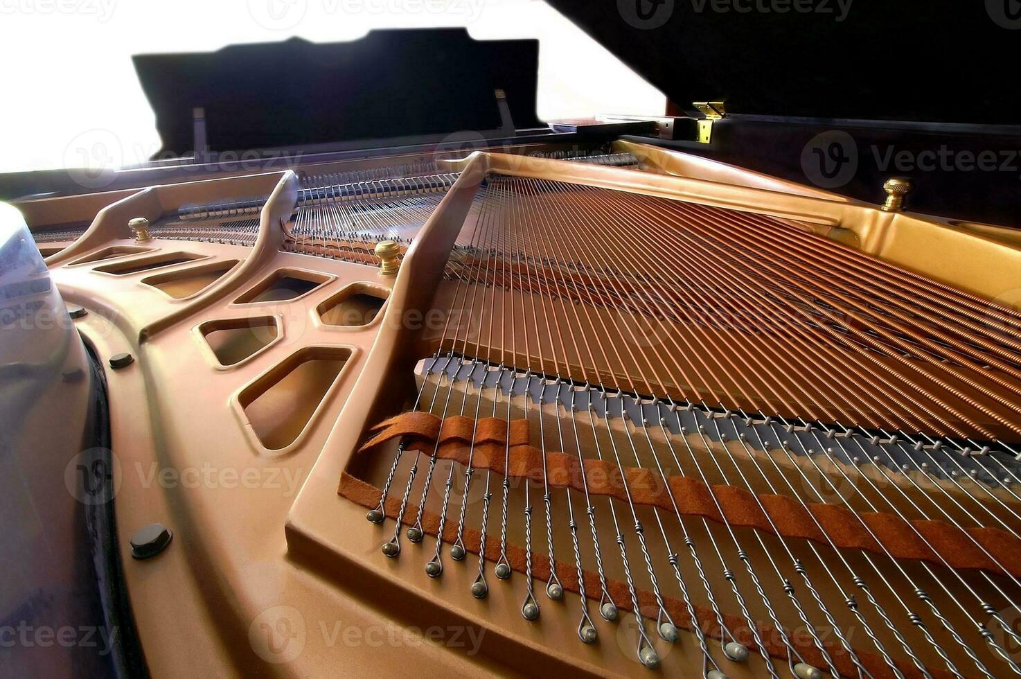 Elegant Grandeur Interior View of a Grand Piano photo