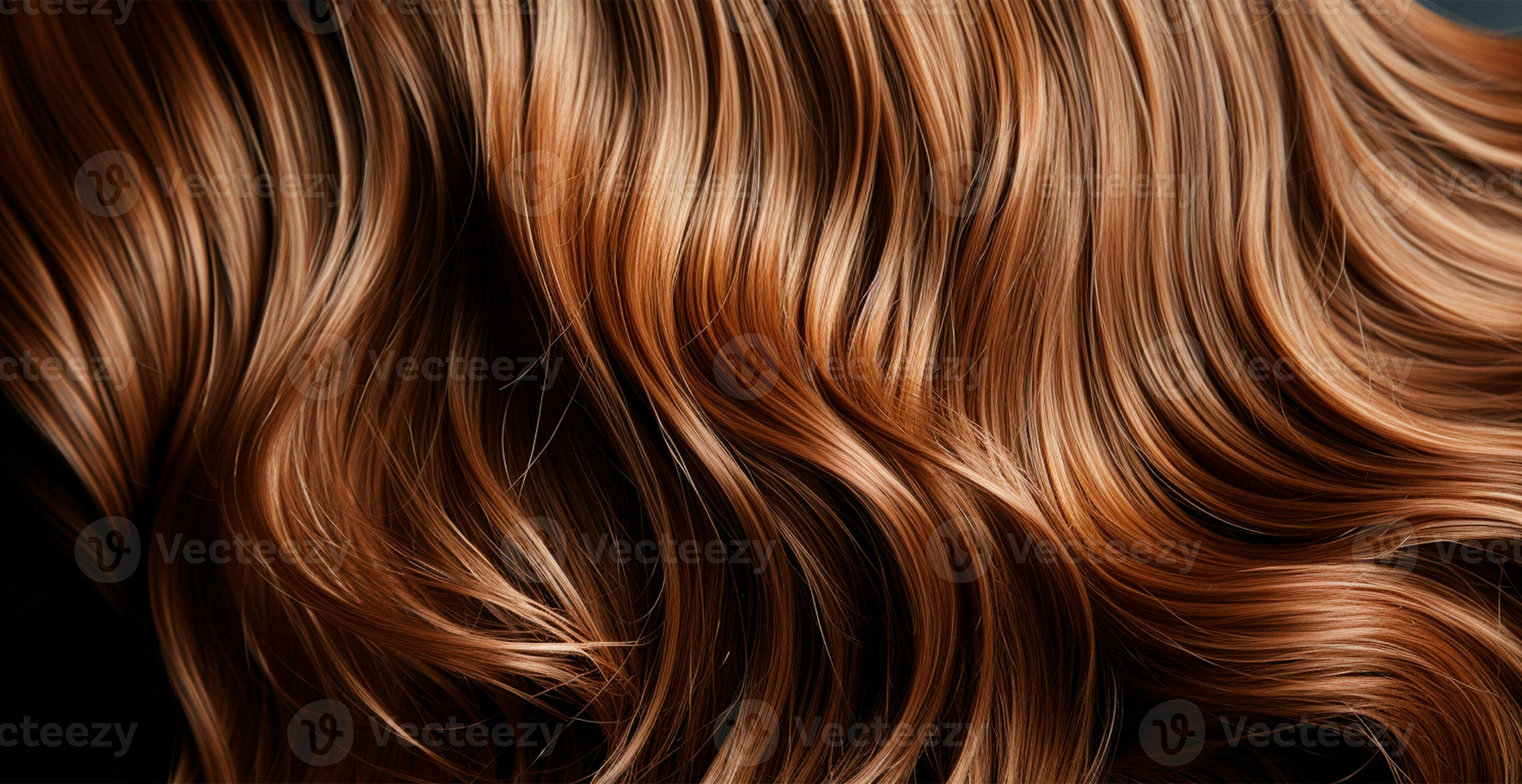 Brown hair close-up as background. Women's long natural dark hair. Wavy