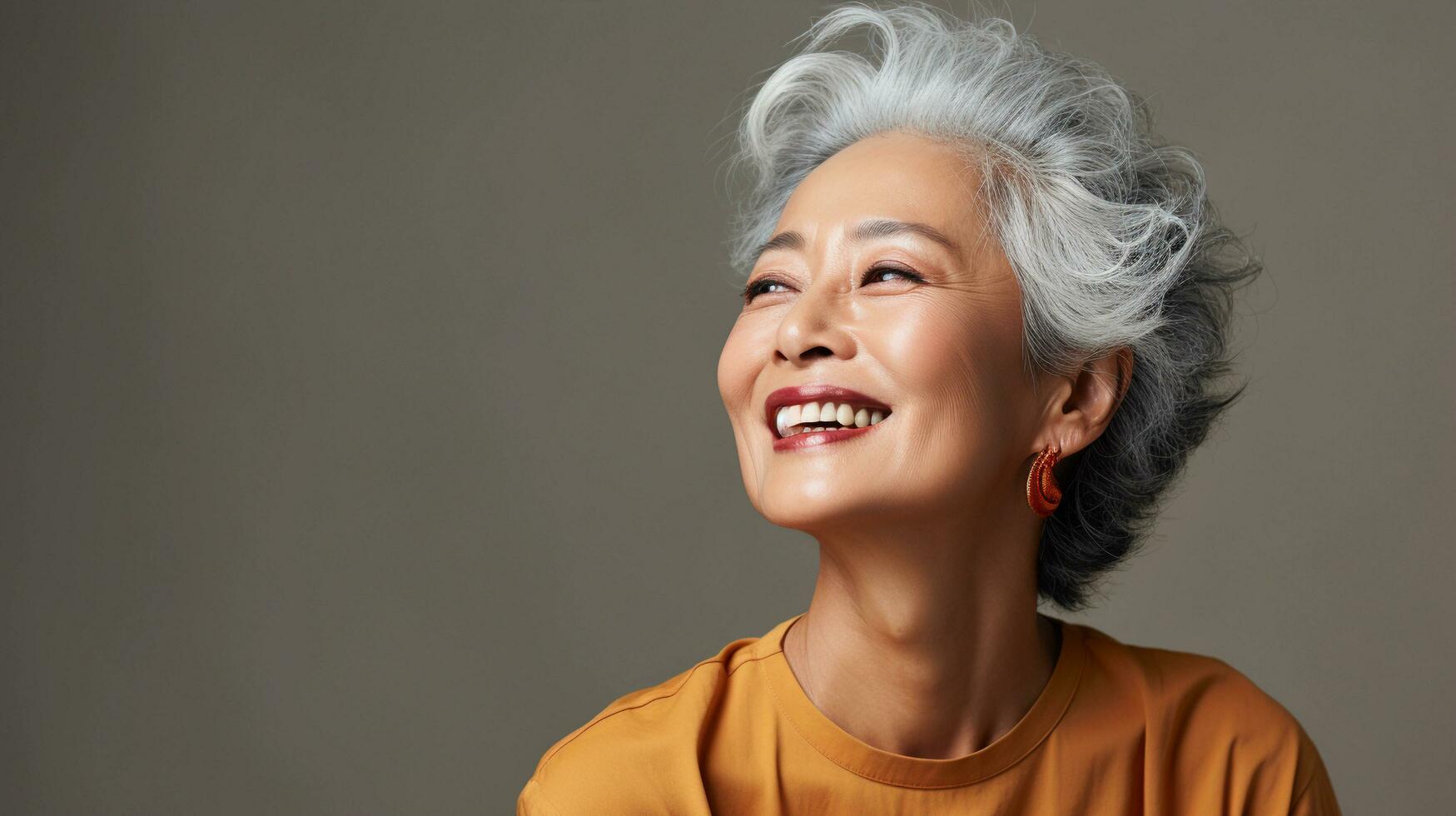 Happy and smiling attractive beauty asian senior woman, isolated on plain background studio portrait,AI Generated photo