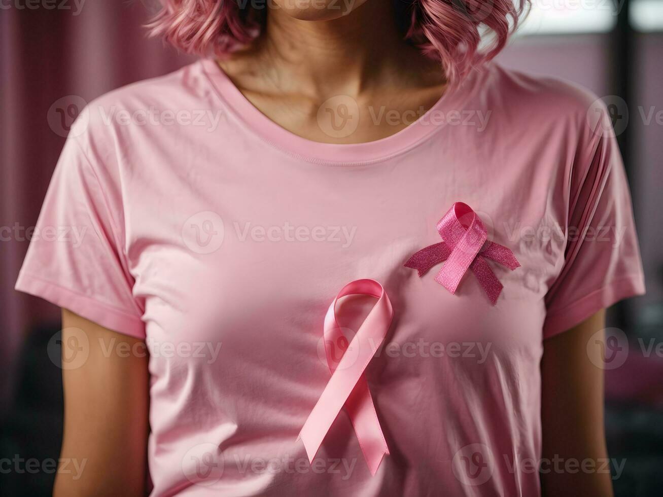 Breast Cancer Awareness Pink Ribbon on Shoulder of woman photo