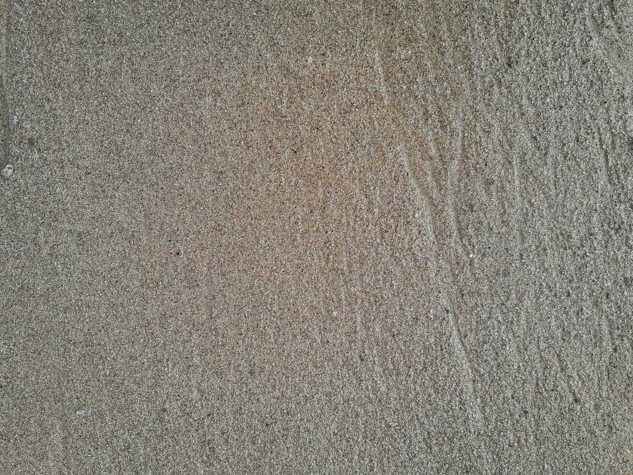 Texture of the sand on the East Java beach photo