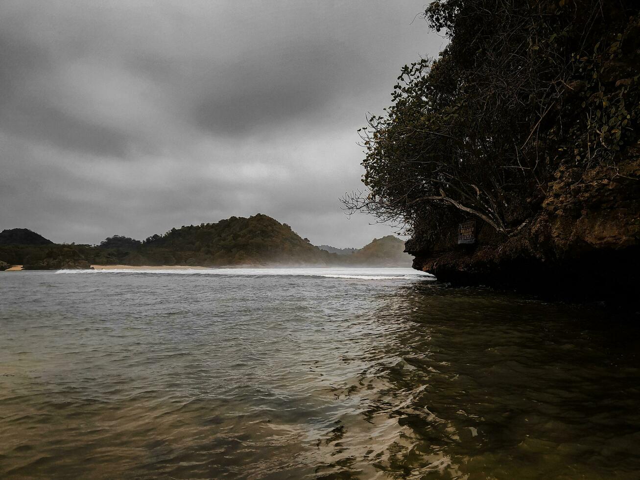 Small waves on the sea at teluk asmara beach. Malang city, East java indonesia photo