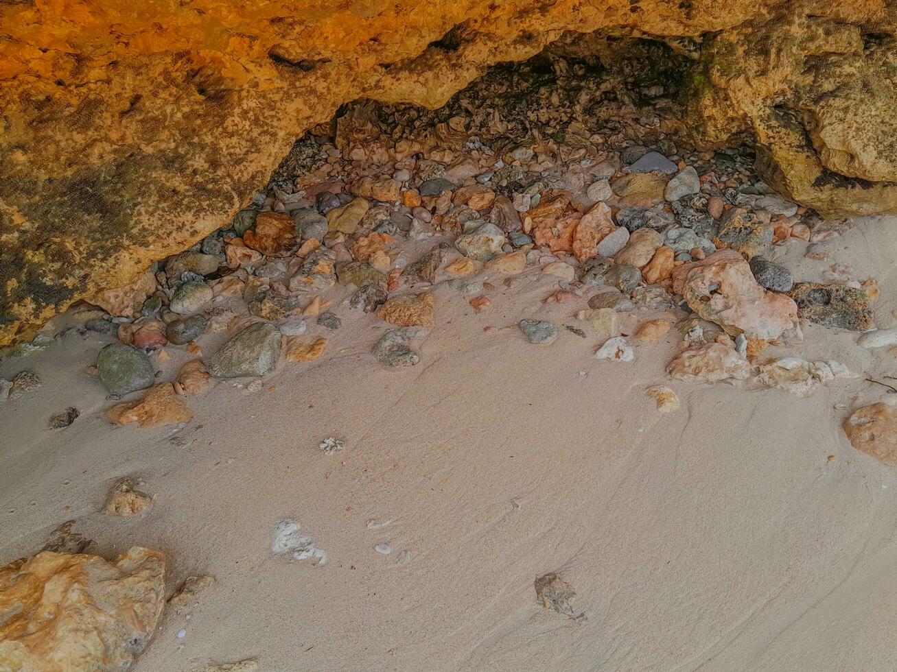 Coral stone on the shore at East Java beach photo