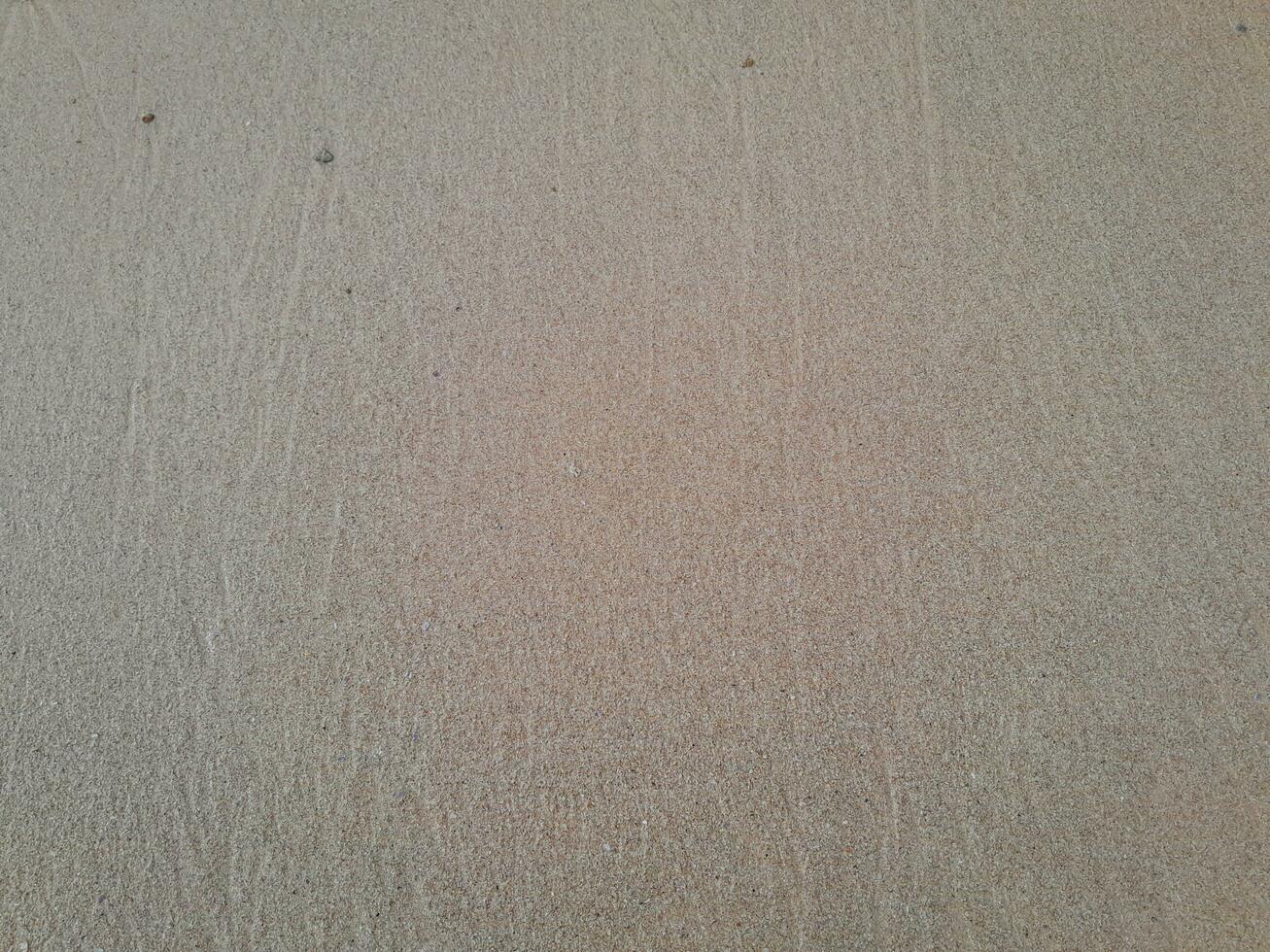 Texture of the sand on the East Java beach photo