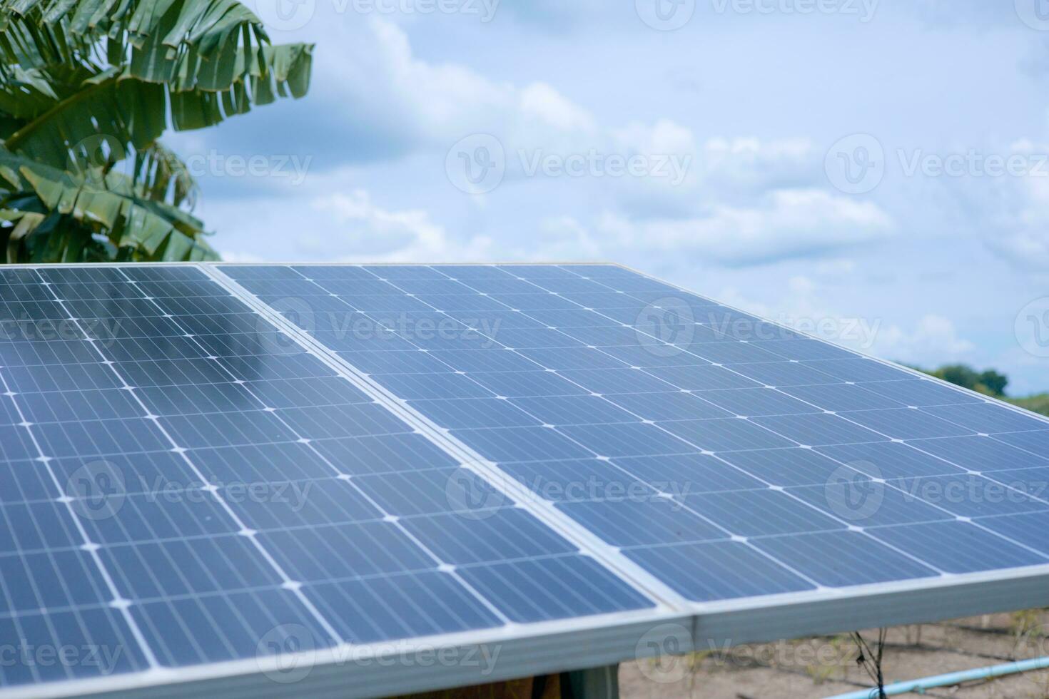 Solar panels with alternative energy sources, sky background photo