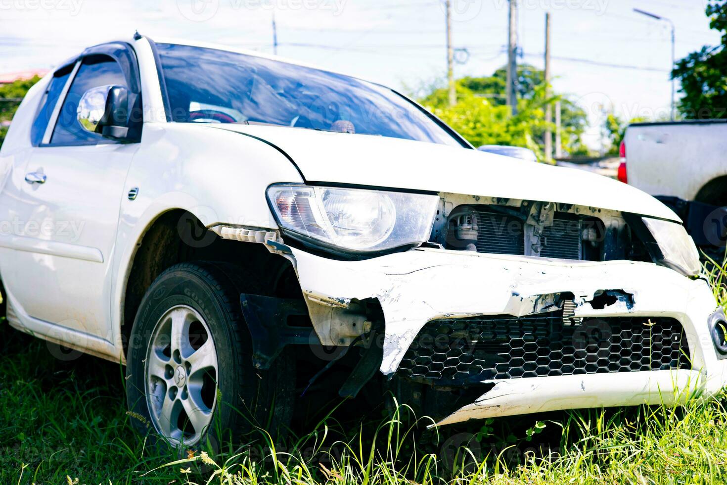 The front of the car was damaged and broken in a road accident, so the car could not be driven further. photo