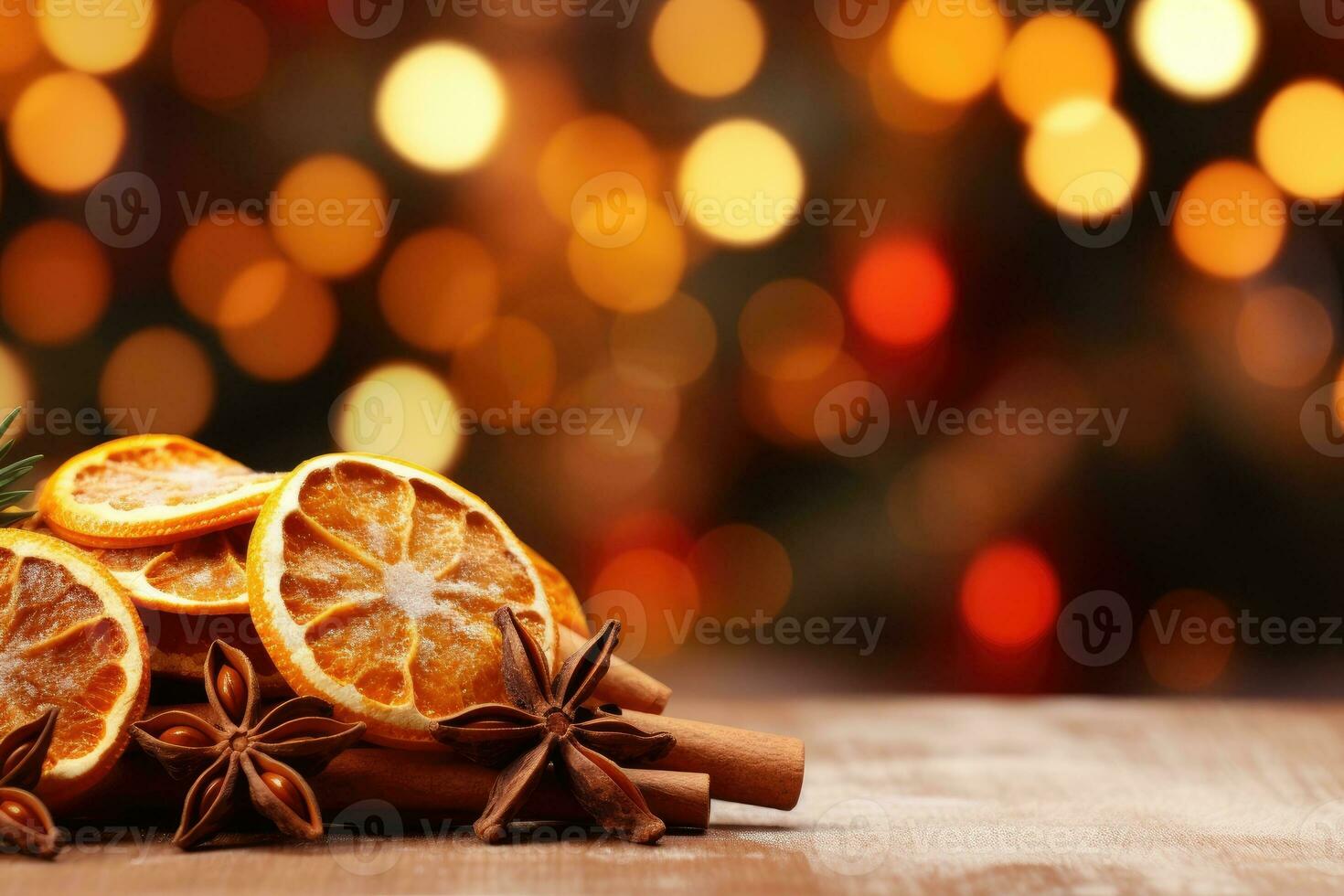 Traditional Christmas spices and dried orange slices on holiday light background. Christmas spices decoration photo