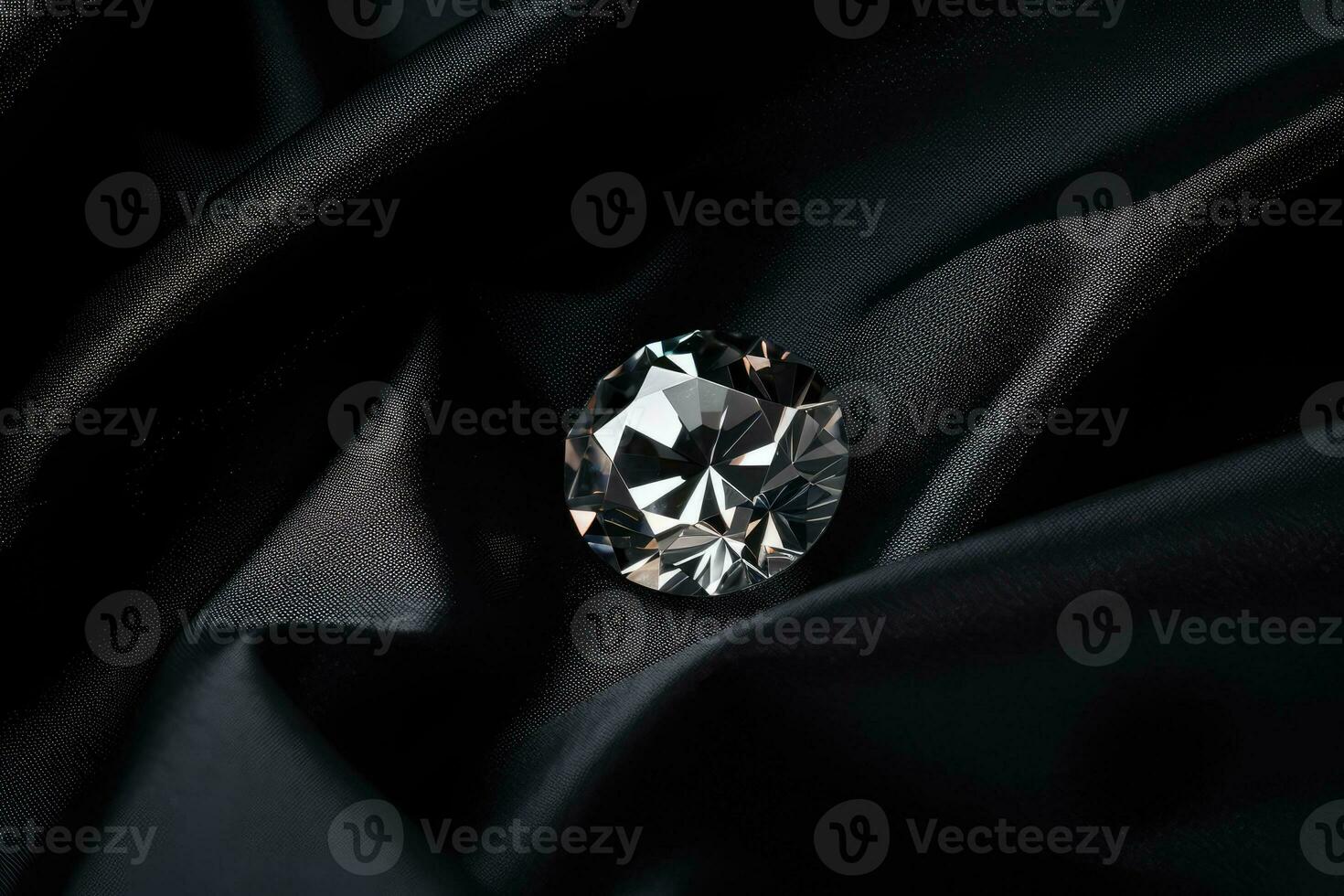 Luxury diamond on a black fabric background. Expensive jewelry photo