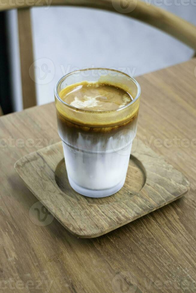 Dirty coffee on wooden table, stock photo