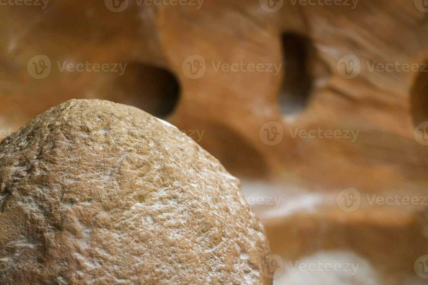 Brown sand-colored stone tiles on the wall photo