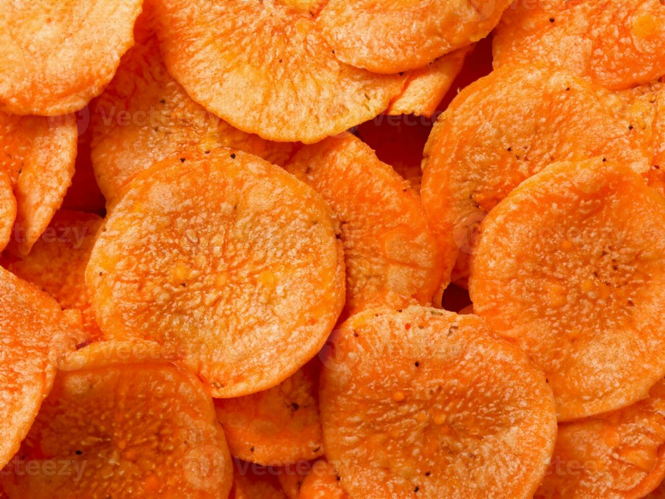background of fried carrot slices photo