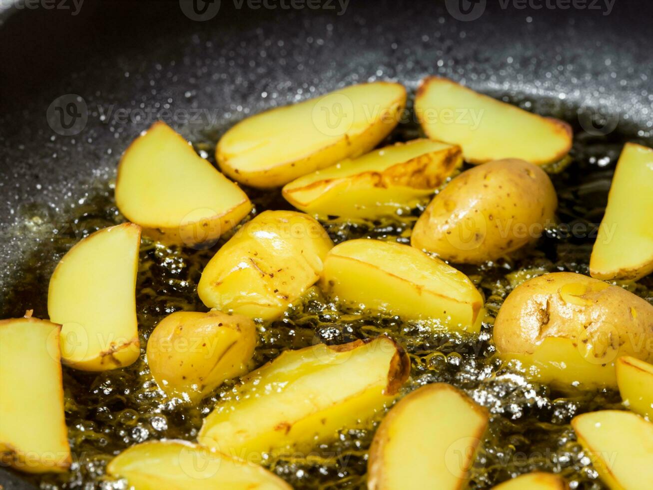 fried potatoes on the pan. photo