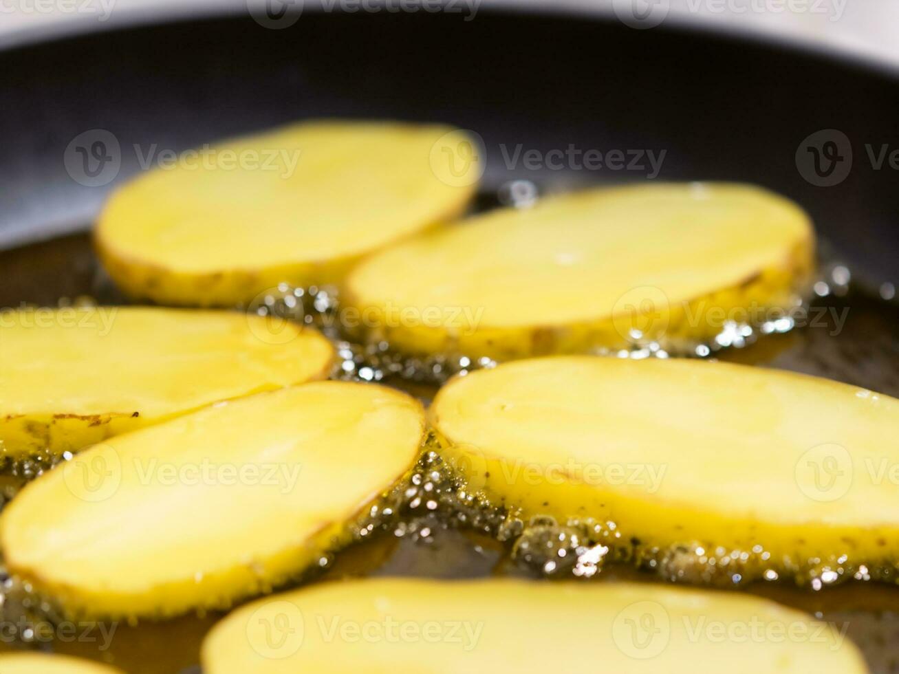 frying pan with fried potatoes. photo