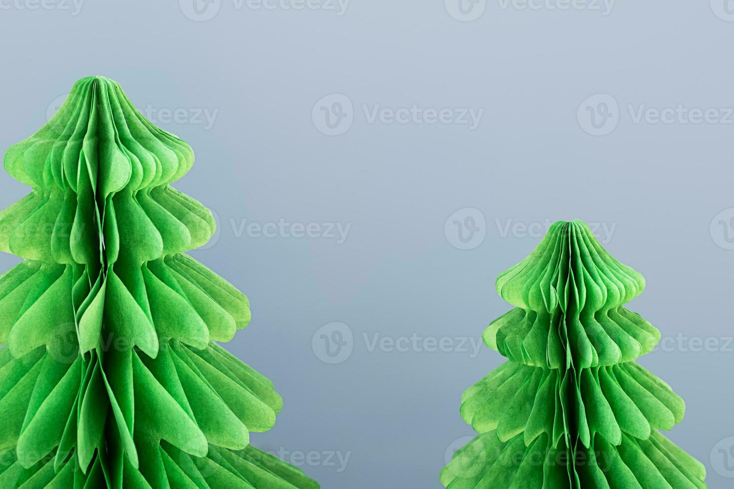 Trend paper Christmas trees. DIY alternative Christmas decoration, close up. photo