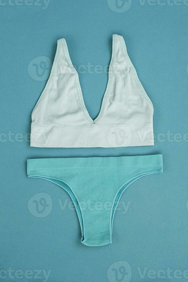 Females underwear set. Monochrome flat lay. photo