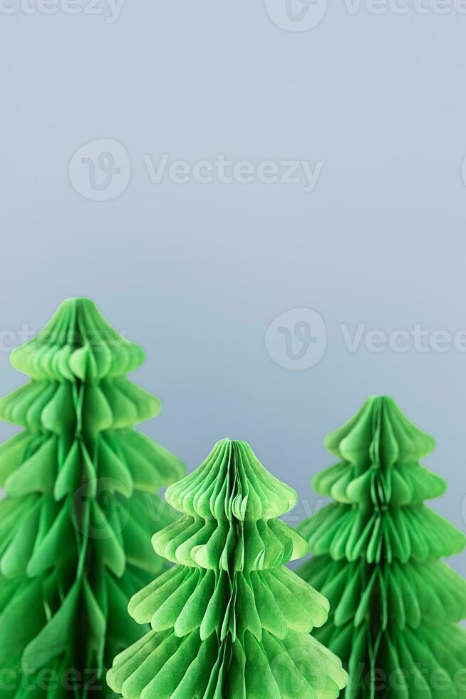 Trend paper Christmas trees. DIY alternative Christmas decoration, close up. photo