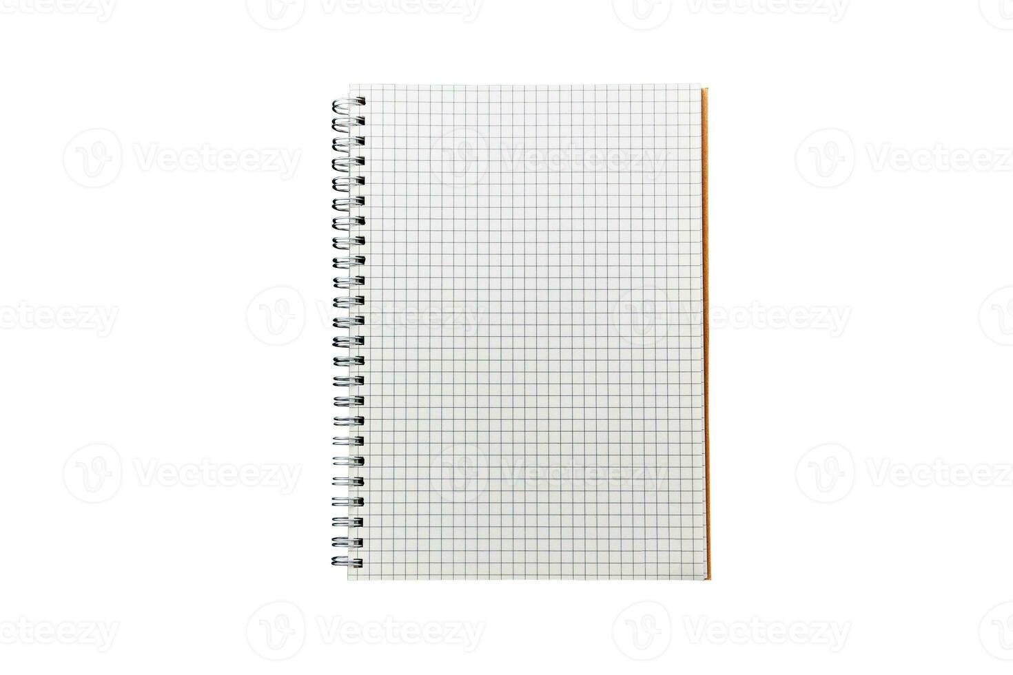 Grid paper notebook isolated on white background in top view photo