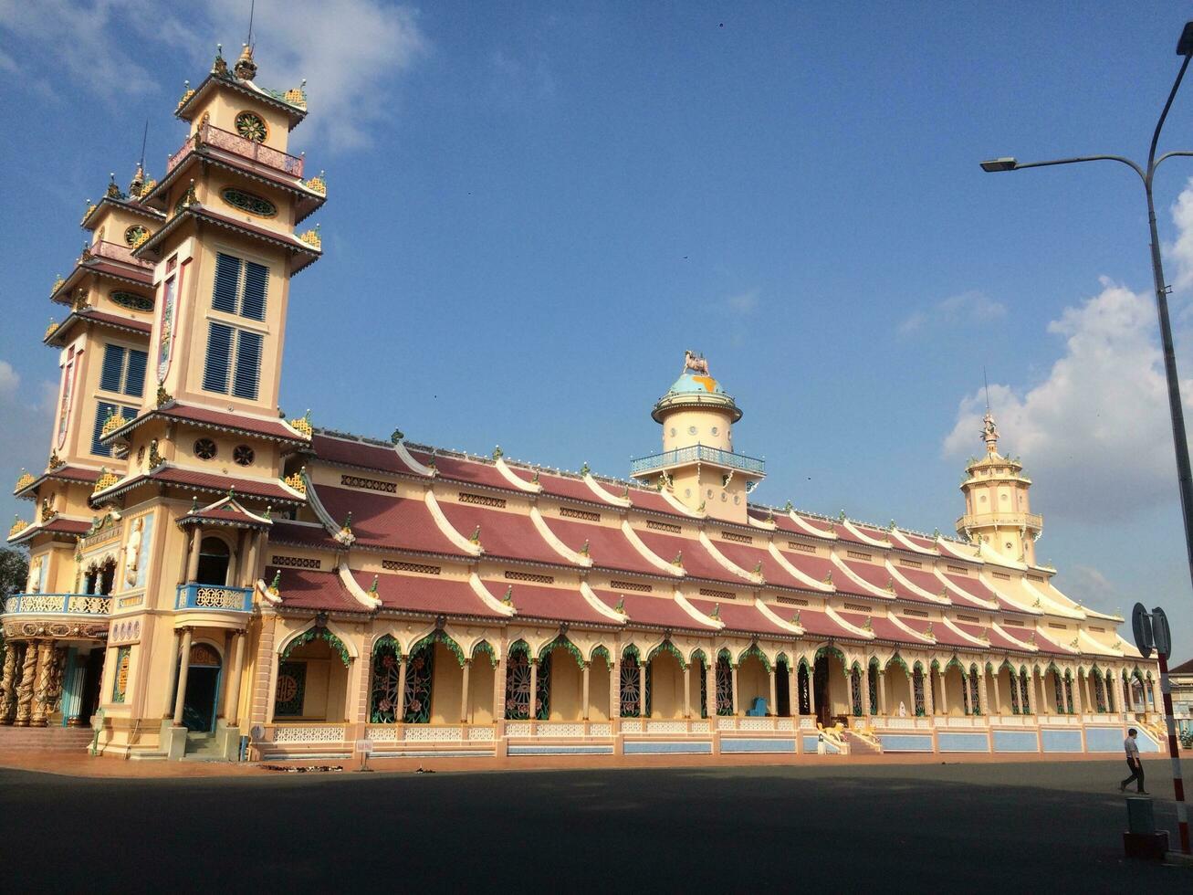 Cao Dai pagoda in Vietnam scene sunny photo