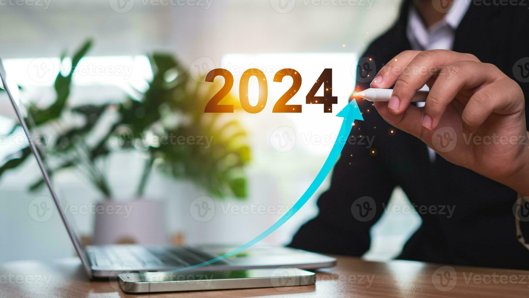 Stock trading. Finance. Investing. Growing business. Businesswoman in suit pointing with a pen at the tip of an arrow and a graph bar Represents business growth in 2024. photo