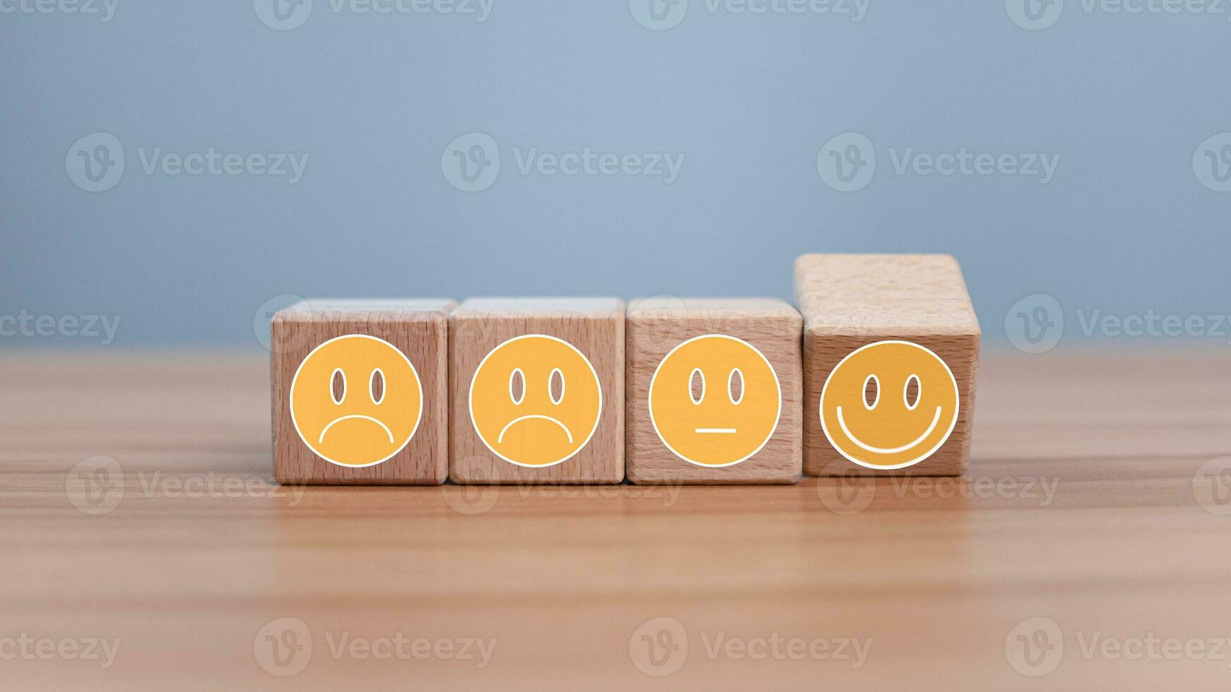 Mental health and emotional state concept, Smile face  and sad face on wooden block cube for positive mindset selection concept. photo