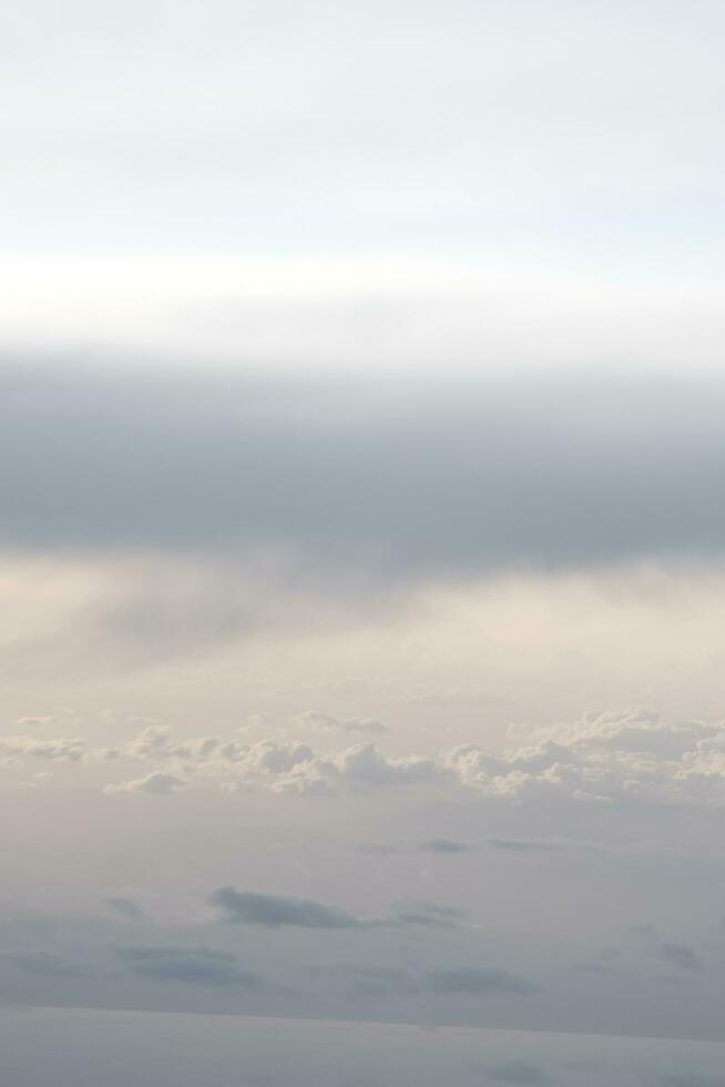 clouds over the sky by sunset photo