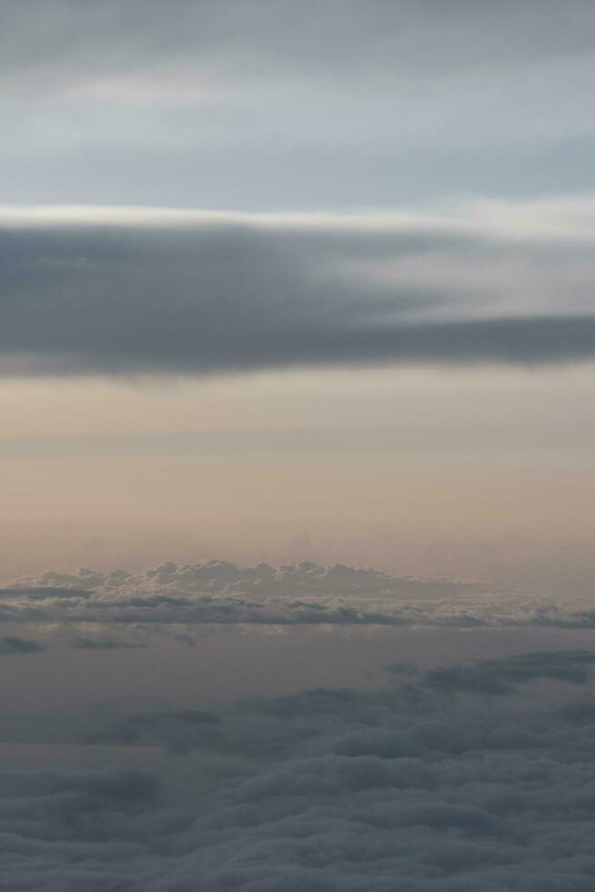 clouds over the sky by sunset photo