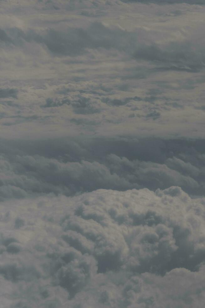 clouds over the sky and sea photo
