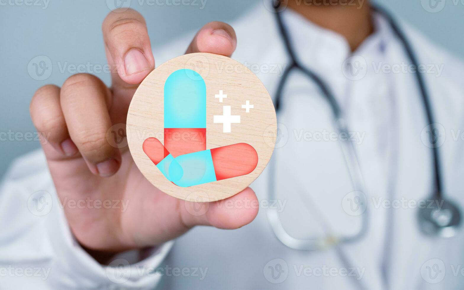 Doctor showing circle wood plank and medicine icon represents medical health care and doctor staff service concept. photo