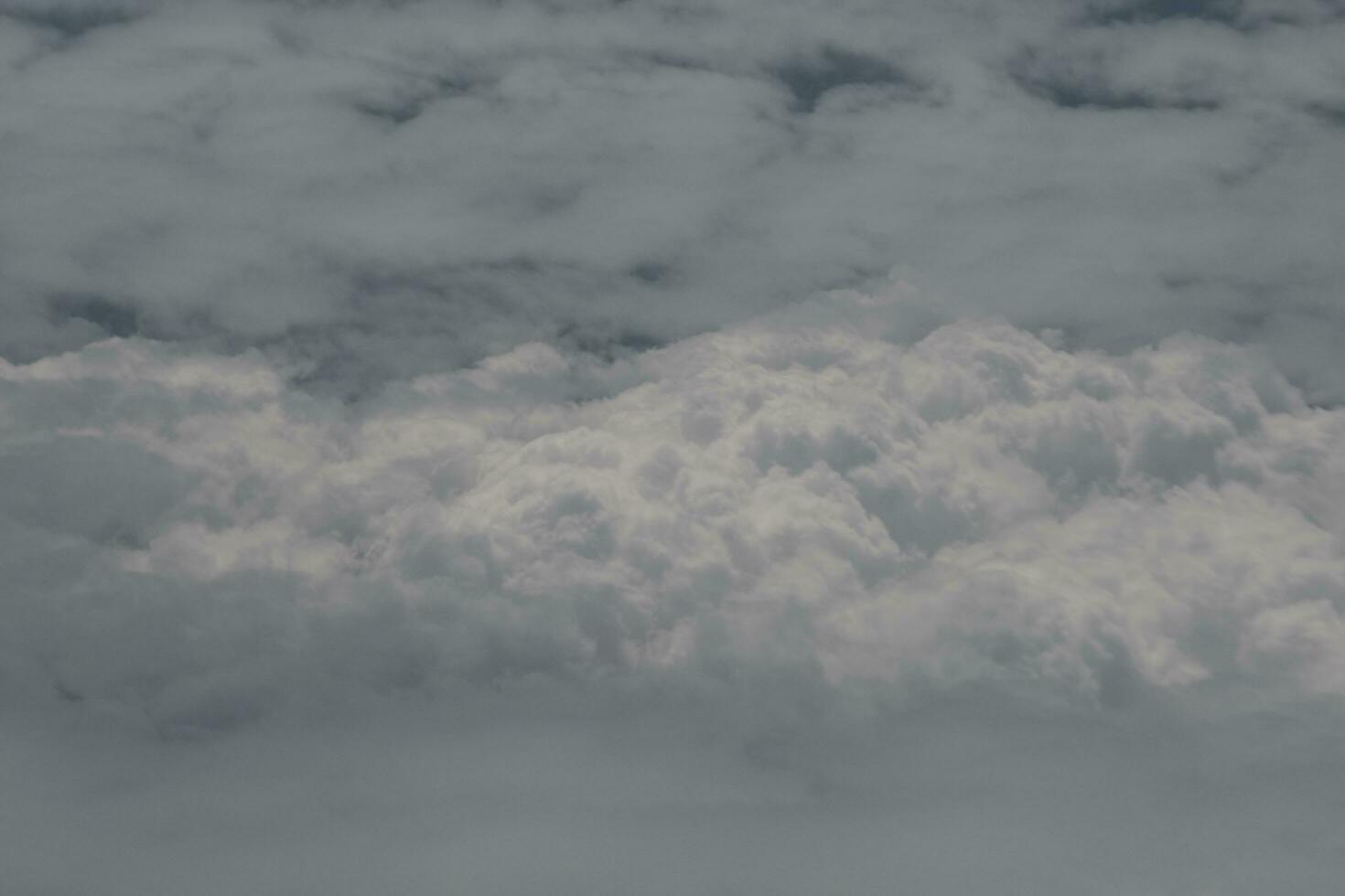 clouds over the sky and sea photo