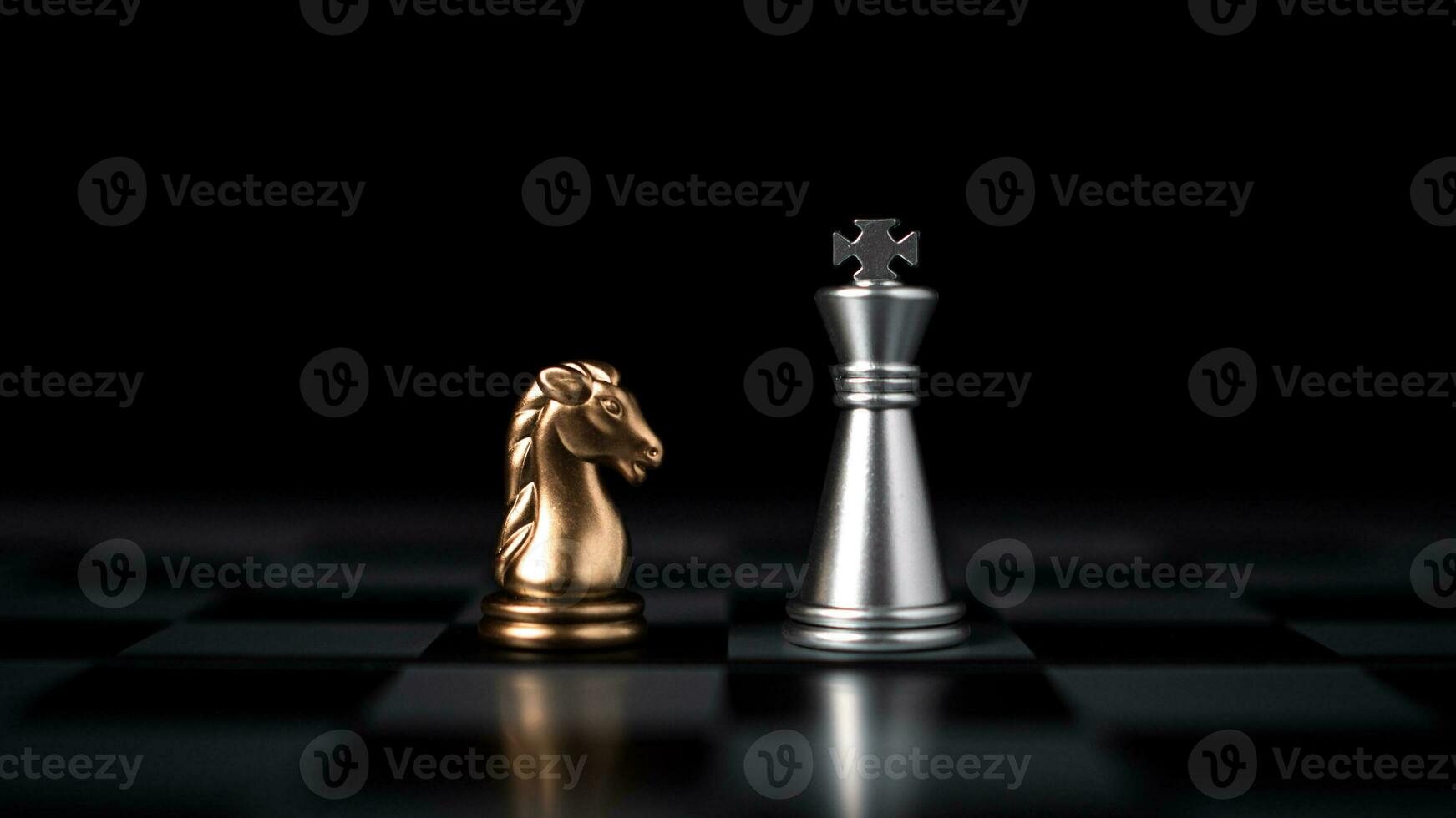 Gold and silver chess pieces in chess board game for business comparison. Leadership concepts, human resource management concepts. photo