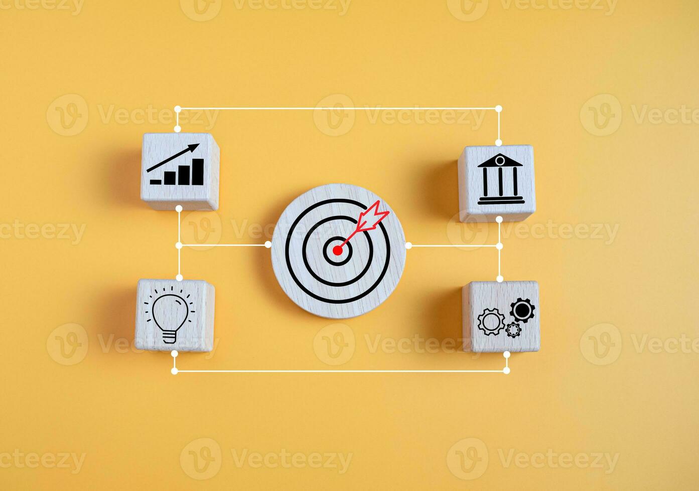 Wood cube block connection with business icon. Concept of business strategy and goal action plan. Yellow background. photo