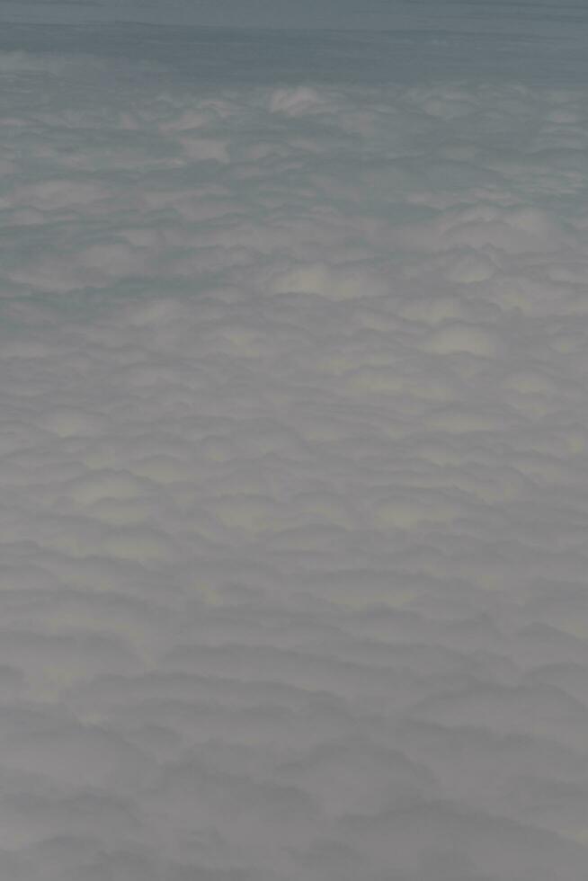 clouds over the sky and sea photo