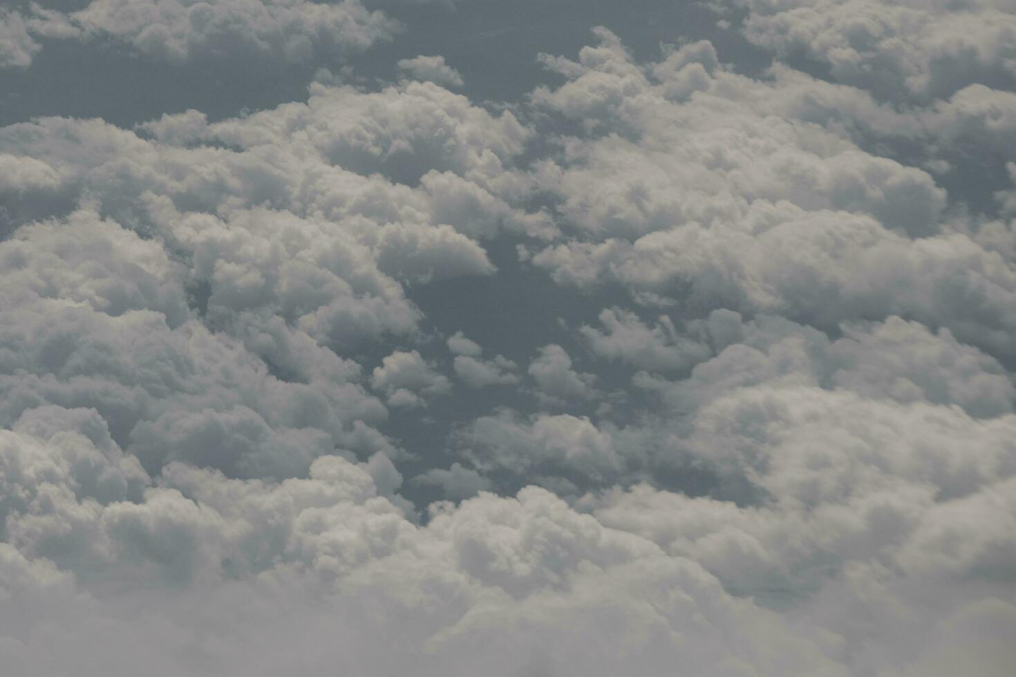 clouds over the sky and sea photo