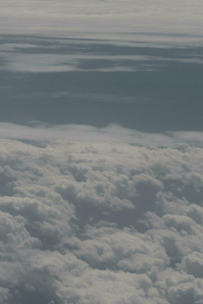 clouds over the sky and sea photo