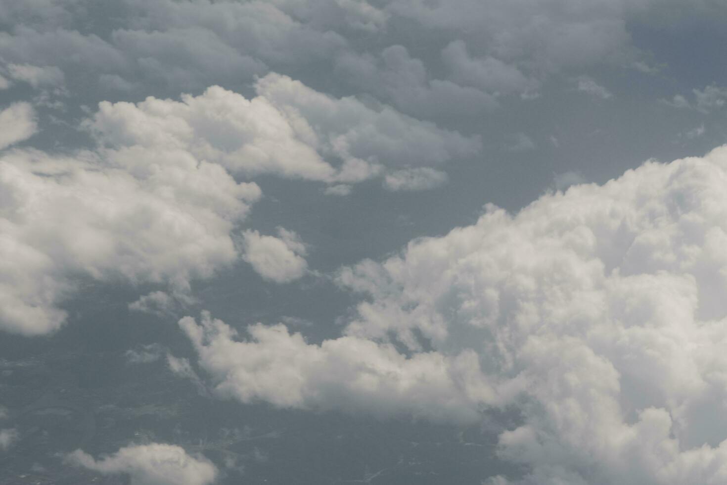 clouds over the sky and sea photo