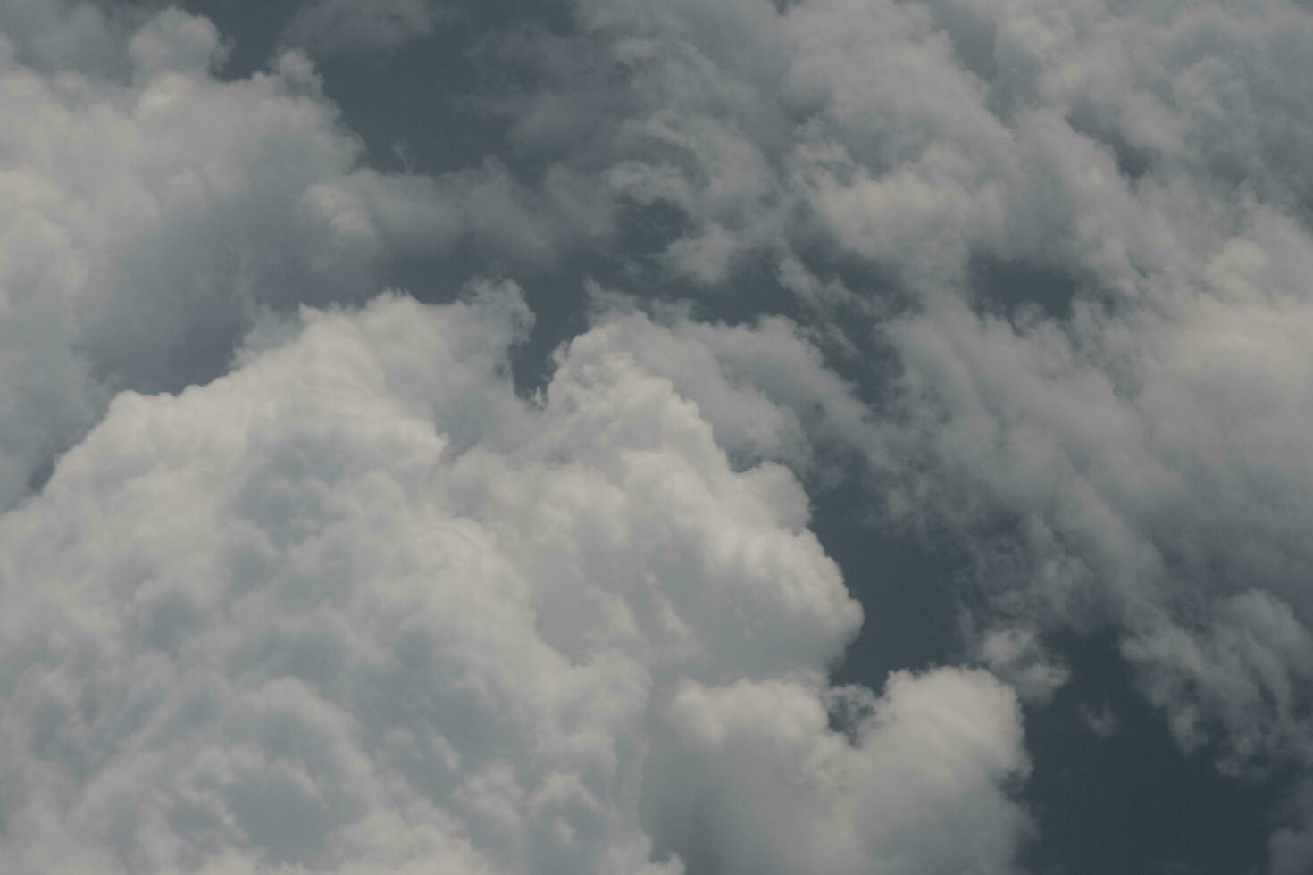 clouds over the sky and sea photo