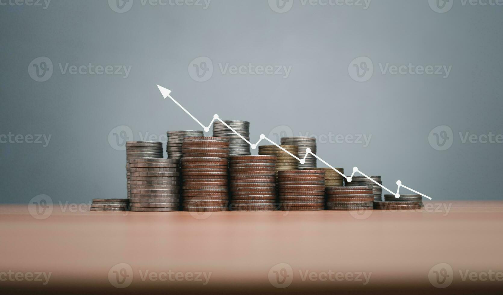 Coins are lined up on a wooden floor along with index charts, arrows and candlesticks. Represents financial, economic, business growth concepts. Financial success concept. Abstract finance background. photo