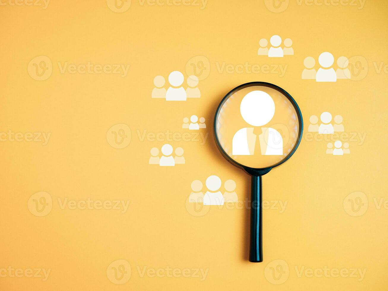 Team management concepts, human resources, recruitment concepts, human resource management or human resource management concept, Manager icon in magnifying glass placed on yellow background. photo