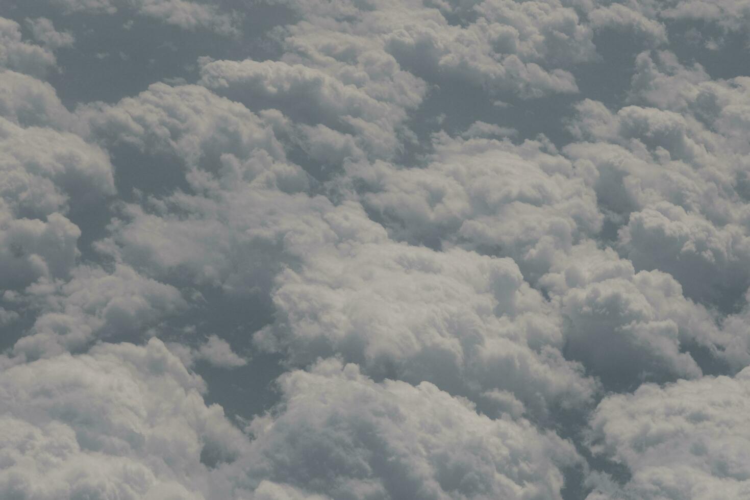 clouds over the sky and sea photo